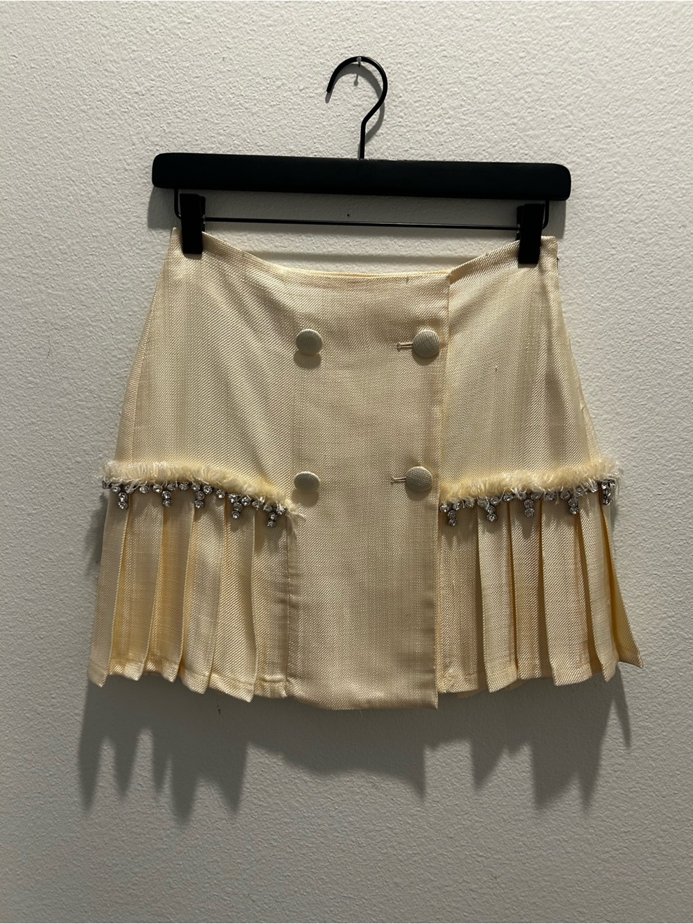 AREA Cream Pleated Mini Skirt with Crystal Fringe